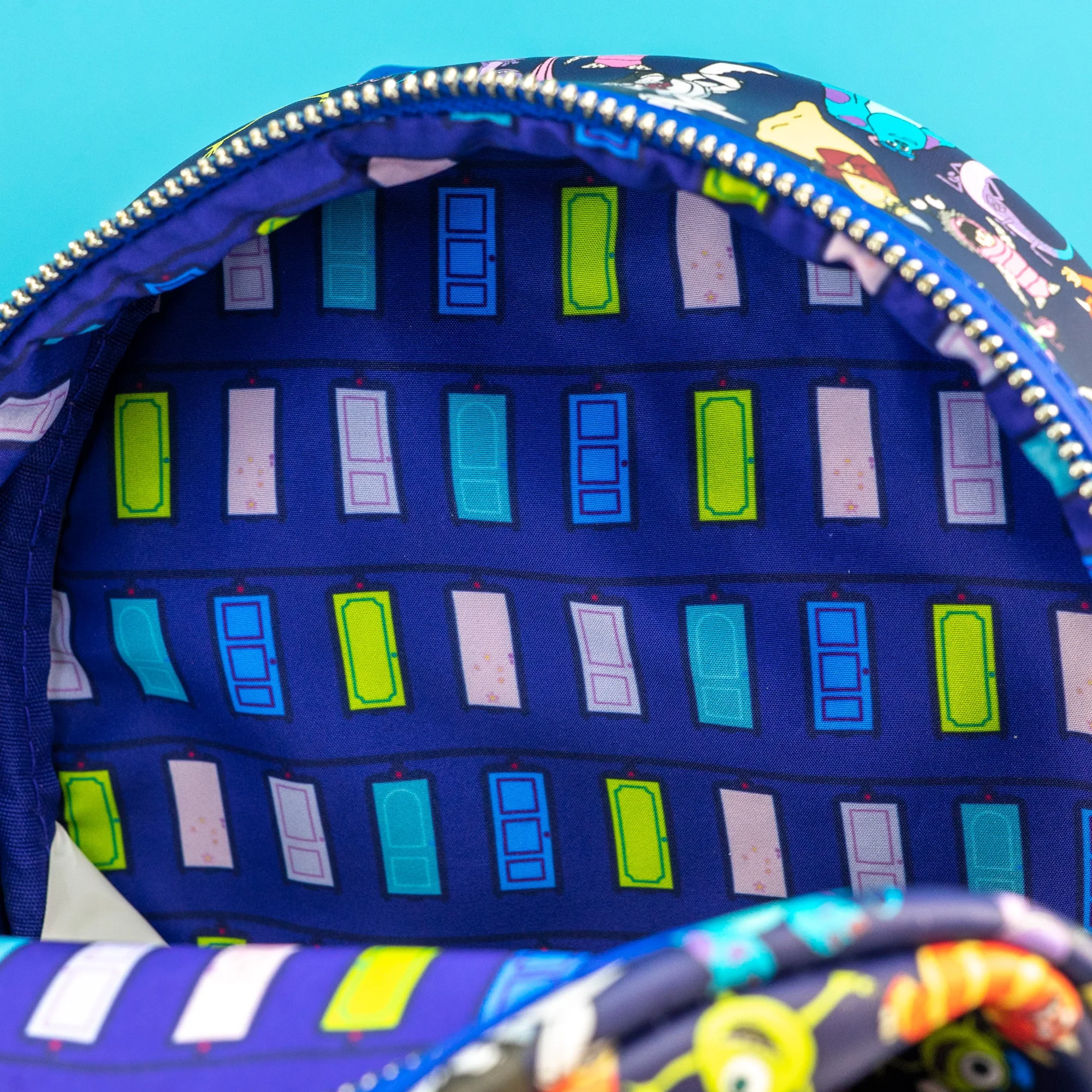 Loungefly x Disney Pixar Monsters Inc AOP Mini Backpack - Image 5